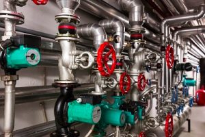 Commercial piping with red cranks