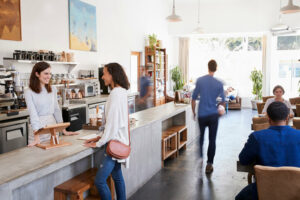 happy customers and employees inside commercial space